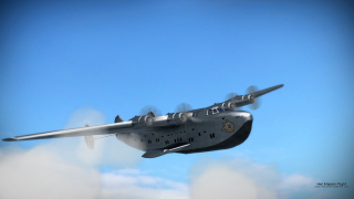 Large airplane flying blue sky 4 - a few cloud below free wallpaper