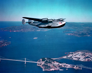Plane flying water bridge city - kodachrome free wallpaper