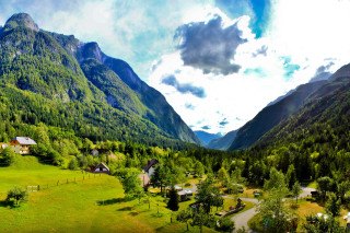 Valley mountain village cloudy sky - a scenic view of a valley free wallpaper for desktop