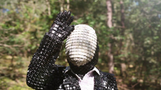 Sculpture man cellphone woods trees - a cell free wallpaper