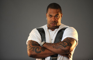 Tattooed man crossed arms serious - his arm and chest free wallpaper