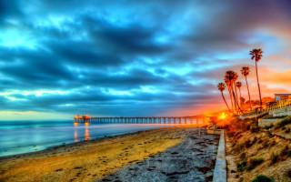 Beach pier palm trees sunset 2 - a pier in the distance free wallpaper