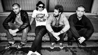 Men bench sidewalk building group - a bench next free wallpaper