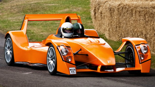 Man orange racecar road hay - a man driving free wallpaper