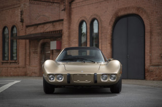 Tan sports car brick building - a brick building free wallpaper