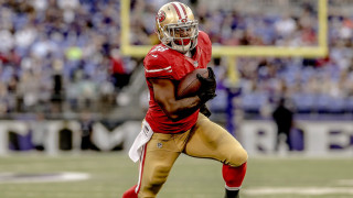 Football player running with ball 6 - a football player running free wallpaper