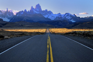 Road yellow line mountains snow - emiliano ponzi free wallpaper