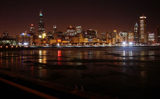 City skyline night water bridge 4 - a body of water in front free wallpaper