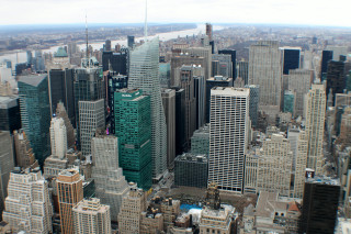 City tall buildings river background - tall building and a river in the background free wallpaper