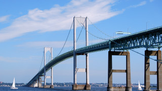Bridge over water boat below - symmetric free wallpaper