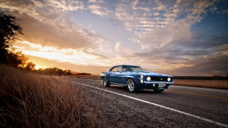 Blue car driving road cloudy - douglas shuler free wallpaper