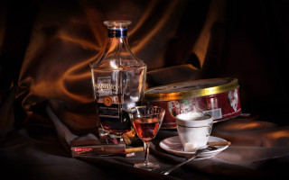 Bottle of liquor on table - a cup free wallpaper
