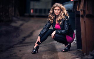 Woman pink top black pants - a pink top free wallpaper