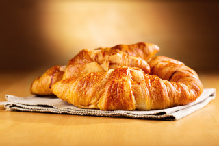 Croissants napkin tabletop blurry background - a napkin free wallpaper
