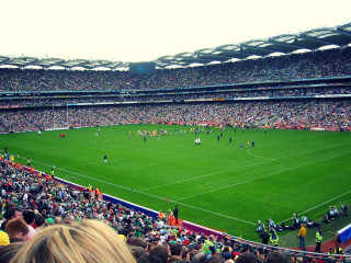 Crowd soccer game stadium green - a large crowd of people watching free wallpaper