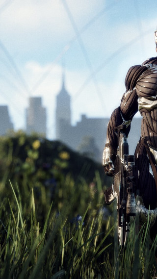 Man bike green field building - a man riding free wallpaper for mobile