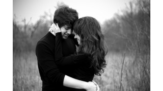 Man woman hugging field tall 2 - photo of them free wallpaper