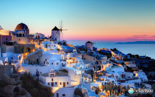 Town windmill sunset view scenery 2 - a view of a town free wallpaper