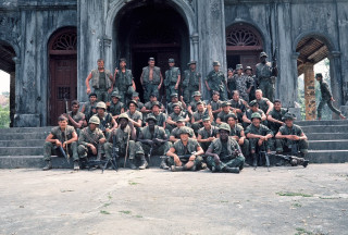 Soldiers group photo building door - a door free wallpaper
