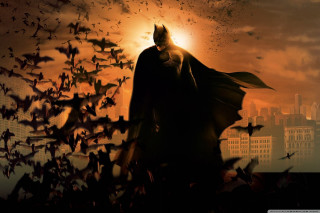 Batman city bats flying sun - the middle of a city free wallpaper