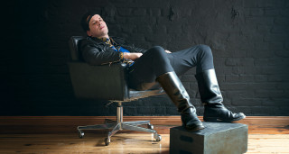 Man sitting chair legs crossed 5 - his foot free wallpaper