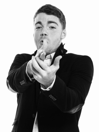 Man suit pointing finger camera - a finger free wallpaper for mobile