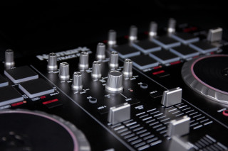 Dj mixing equipment black background - studio photography free wallpaper