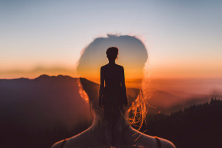 Woman mountain sunset hair wind - surreal free wallpaper for desktop