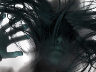 Blurry woman hair creepy face - a creepy look free wallpaper