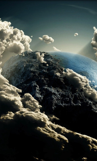 Planet clouds sun shining through - a planet free wallpaper