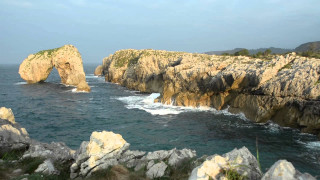 Rocky coastline large formation arch - a rocky coastline free wallpaper