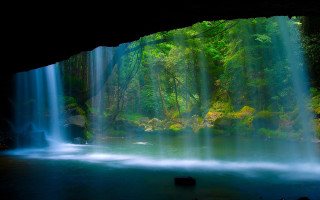 Waterfall forest light small waterfall - a waterfall in a forest free wallpaper