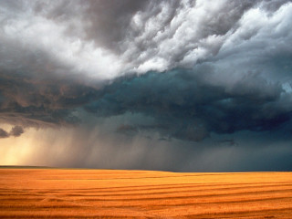 Dark sky thunderstorm cloudy horizon - a large field free wallpaper