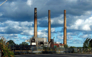 Factory smokestacks cloudy sky road - a factory free wallpaper