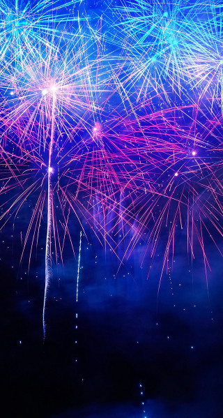 Fireworks sky blue clouds pink - free new year wallpaper for mobile
