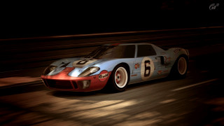 Racing car speeding night track - racing free wallpaper