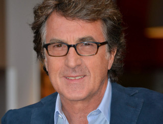 Man smiling glasses blue jacket - blue shirt free wallpaper