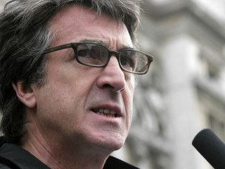 Man glasses speaking microphone clock - thierry doizon free wallpaper