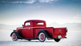 Red truck snow field mountain - a red truck free wallpaper for desktop