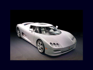 White sports car dark room - a white sports car free wallpaper for desktop