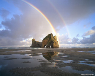 Rainbow rock formation beach reflection - the beach free wallpaper