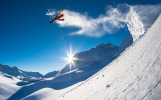 Snowboarder snowy mountain slope sunlight - a snowboard free wallpaper