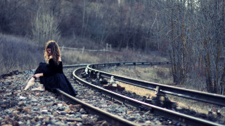 Woman sitting train track cell - the track free wallpaper