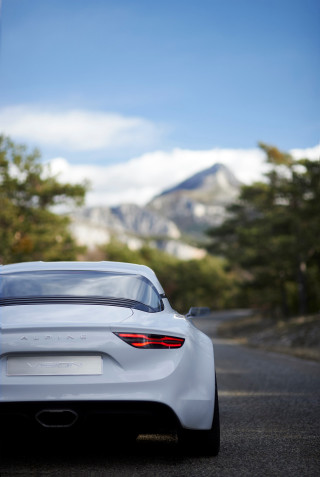 White car forest mountains blue - a white car free wallpaper for mobile