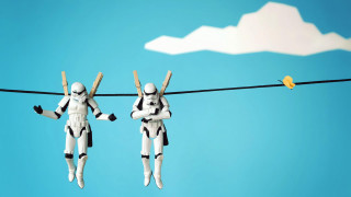 Toy figures hanging wire bird - war free wallpaper