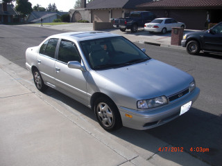 Silver car parked street sidewalk - the side of a street next free wallpaper