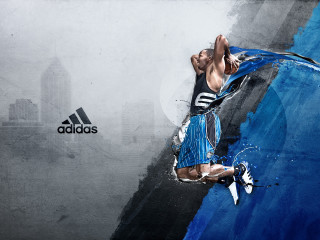 Man jumping basketball city background - his hand and a city in the background free wallpaper
