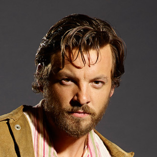 Man beard jacket serious pose - clark voorhees free wallpaper for tablet