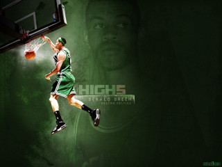 Basketball player green uniform jumping - a basketball player free wallpaper