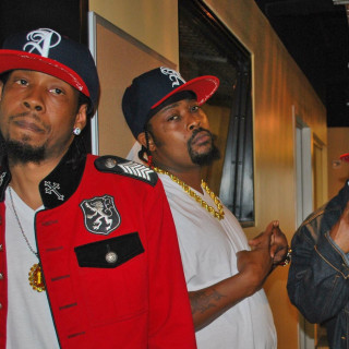 Two men red jackets standing - complex free wallpaper for tablet